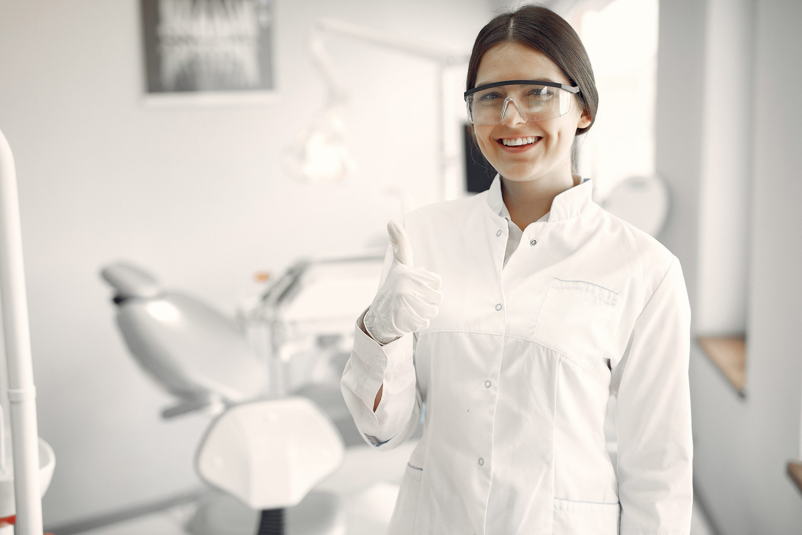 beautiful-dentist-working-dental-clinic-min-scaled